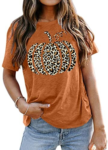 Woman wearing a brown t-shirt with leopard print pumpkin design.