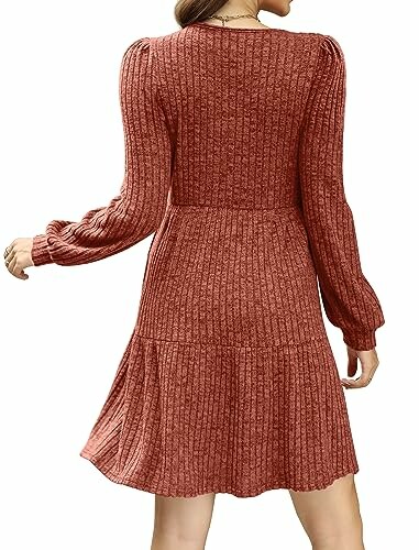 Back view of a red knit dress with long sleeves